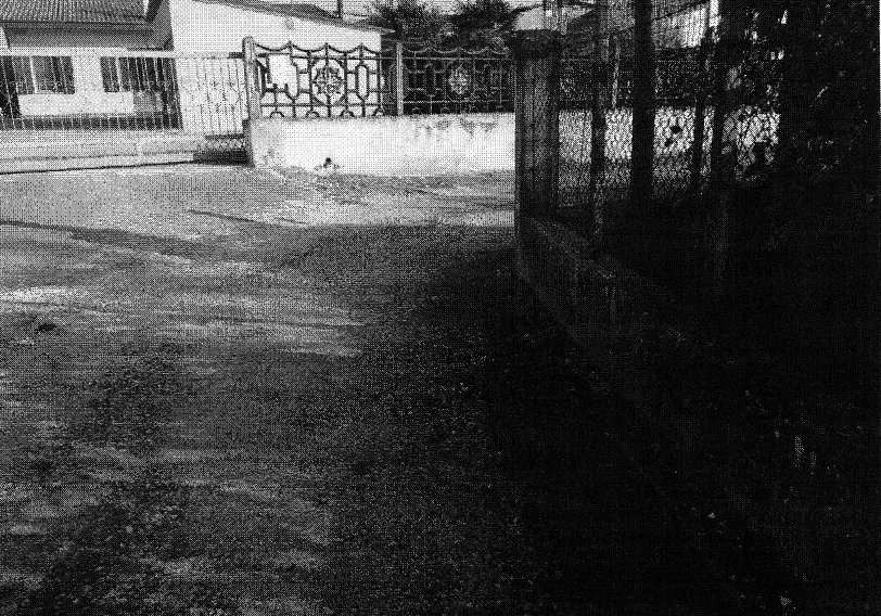 Porzione di fabbricato con garage in lamiera